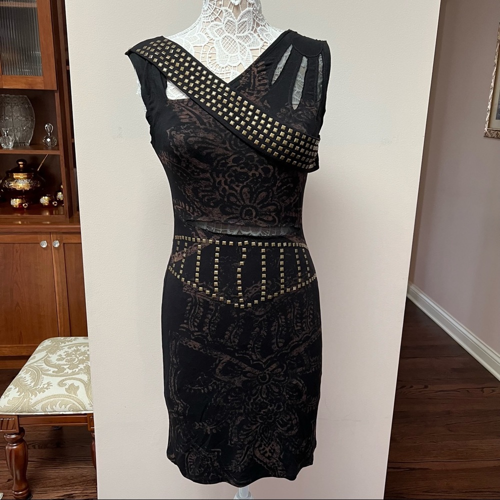 Black jersey dress with gold studs